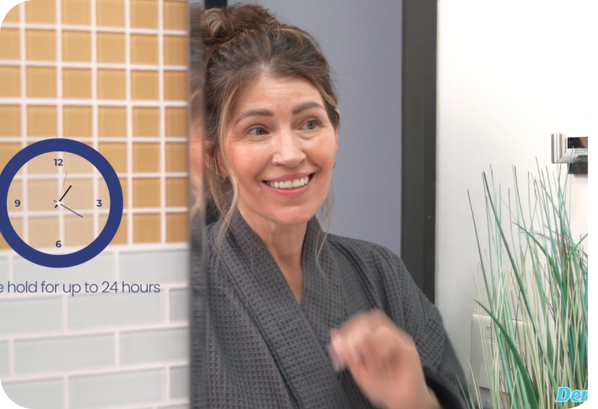 maritssa smiling with dentures in the mirror