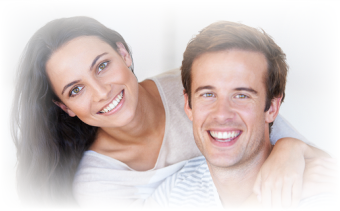 couple smiling with dentures
